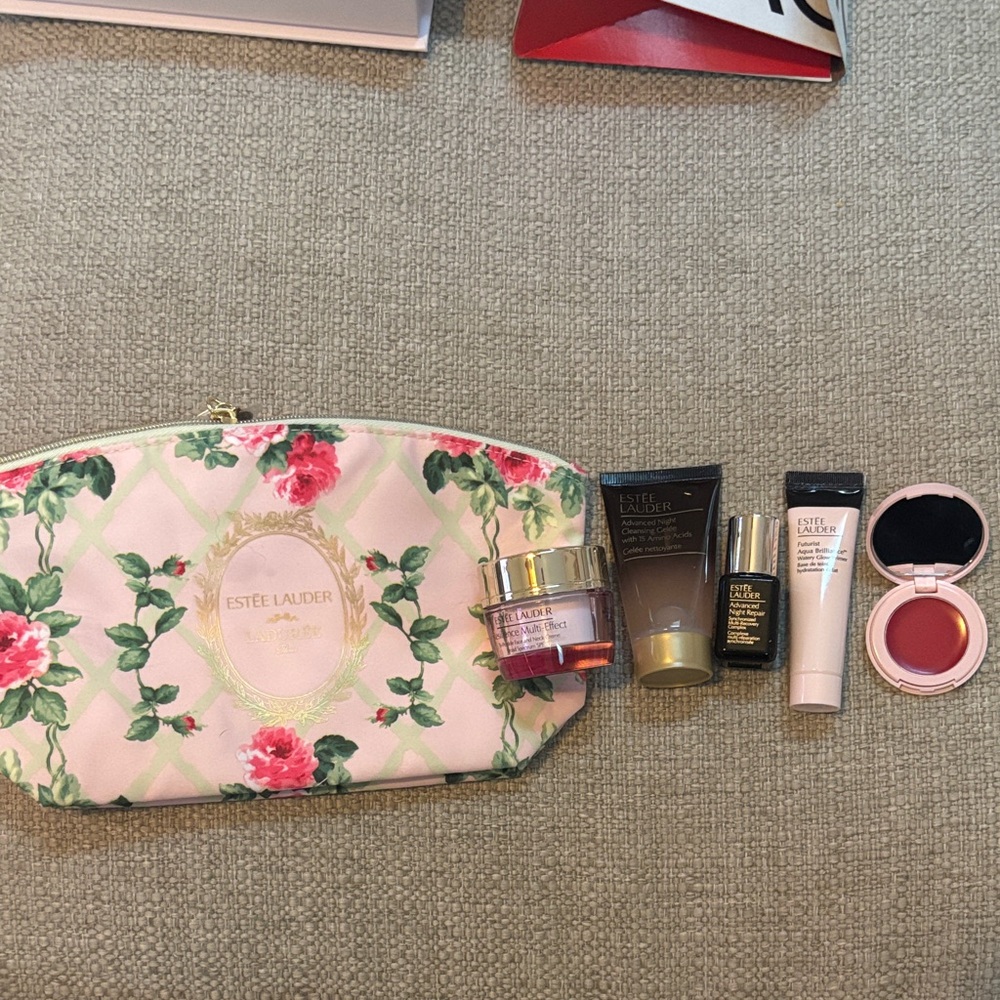 Estee Lauder Pink and Green Floral Cosmetic Bag with products